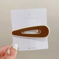 Milk tea color split heart hair clip in dark coffee and beige resin on card - Brown Teardrop