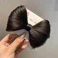 Dunkelbraune Haarklammer in Schleifenform aus Kunsthaar für elegantes Haarstyling - Schwarzbraun