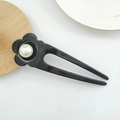 Elegant black flower hair fork with a white pearl accent and minimalist U-shaped pin design - Black