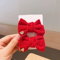 Paio di fermagli per capelli a fiocco in velluto rosso per bambine con cuori dorati - Cuore Piccolo