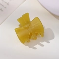 Molletta a fiocco giallo senape in acetato con scritta bianca Barrette La France laterale - Giallo