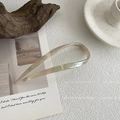 Elegant U-shaped hair fork with marbled pearlescent texture resting on display cards - U-Shaped Hair Pin / Multicolor