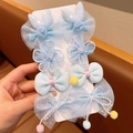 Set of light blue girl's hair clips with lace bunny ears and pearl bow accents - Blue Series