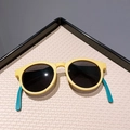 Occhiali da sole pieghevoli per bambini montatura gialla opaca e stanghette blu - Giallo / Nero