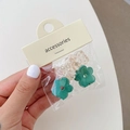 Mini-Haarklammer-Set Blumenform aus grünem und transparentem Harz auf Karte - Blumen Champagner & Grün