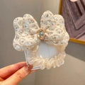Sparkling cream bow hair tie with silver sequins and a central faux gemstone embellishment - Hair Tie / Yellow Bow Hair Tie