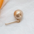 Elegante horquilla de perla champán con gancho de metal dorado para coleta de mujer - Champán