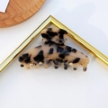 Triangle acetate medium hair claw clip in classic leopard tortoiseshell pattern - Tortoise