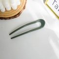 Minimalist U-shaped hair fork in deep forest green resin with a sleek polished finish - Bean Green