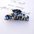Large tortoiseshell acetate hair claw clip with dark blue and cream marble pattern - Celadon