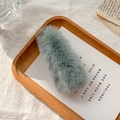Furry plush hair clip in sage green color with soft minimalist winter style design - Bean Green