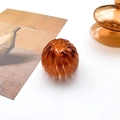 Nesting bird nest hair clip in amber tortoiseshell resin finish for elegant hair styling - Red Brown