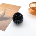 Glossy black bird nest hair claw clip in a stylish expandable spherical design - Black