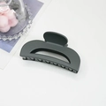 Matte dark grey crescent hair claw clip with hollow geometric design for styling - Gray