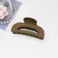 Matte coffee brown crescent moon hair claw clip with a hollow geometric design - Khaki
