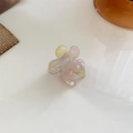 Haarklammer in Blumenform mit rosa und gelbem Marmor-Farbverlauf aus Acetat - Geräuchertes Gelb