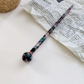 Elegant tortoiseshell acetate hair stick with colorful marble pattern and smooth finish - Multicolor
