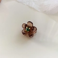 Elegante molletta per capelli a camelia ambra con gemma verde per stile vintage - Caffè Floreale