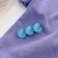 Three connected blue heart-shaped hair clips with a frosted resin jelly texture - Blue