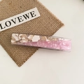 Rectangle acetate hair clip featuring pink and cream marbled patchwork design - Pink