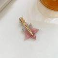 Pink and purple star-shaped acetate hair clip with a marble texture and gold metal base - Pink With Gold Clip