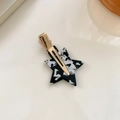 Star shaped black and white marble acrylic hair clip with a gold metallic duckbill base - Cow Pattern With Gold Clip