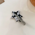 Star-shaped hair clip in black and white floral acetate with silver metal duckbill grip - Cow Pattern With Silver Clip
