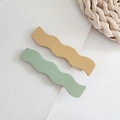 Matte mustard yellow and mint green wavy hair clips in a stylish minimalist two-piece set - Yellow Green