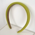 Grass green sponge padded headband with fabric texture on white display box - Fruit Green