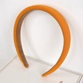 Minimalist orange sponge padded headband with premium twill texture for women - Vibrant Orange