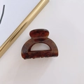 Pinza de pelo de acetato carey marrón con purpurina dorada y diseño hueco - Café