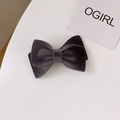 Elegant dark grey velvet bow hair clip with a minimalist double-layered spring clip design - Gray
