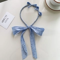 Light blue floral headband featuring elegant ribbons and triple bow design for women - Double Bow Blue