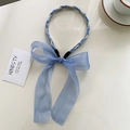 Light blue fabric headband with silk bow, white pearls and woven ribbon detail - Pearl Light Blue