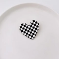 Sweet heart shaped hair clip with black and white checkerboard pattern on white tray - Black & White Checkerboard
