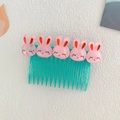 Children's mint green hair comb with five cute pink rabbits featuring LOVE text - Cartoon Rabbit