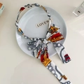 Serre-tête baroque blanc avec imprimé couronne et élégant nœud en ruban de tissu - Style Chanel Blanc