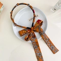Serre-tête rétro en satin orange caramel avec imprimé chaîne et long ruban - Floral Jaune Noué