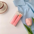 Set of two pink hair roller clips for volumizing hair roots in a stylish desk setting - Pink-Style A
