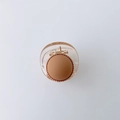 Amber-colored circular hair claw with pink round detail and gold bead accents - Khaki Round