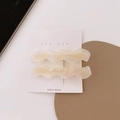 Zweiteiliges Set gewellter Acetat-Haarspangen in zartem, bernsteinfarbenem Creme-Ton - Beige System