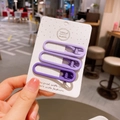 Lot de trois barrettes à cheveux violettes mates pour filles sur carte artisanale - Style Ovale