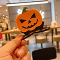 Halloween pumpkin felt hair clip featuring a bright orange carved face and green stem - Pumpkin BB Hair Clip