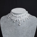 Detailed view of white lace choker necklace with hanging faux pearls for bridal styling - Double Pearl Drop Style (Style 2)