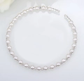 Detailed close-up of handmade bridal choker featuring 8mm pearls and sparkling rhinestones - Necklace