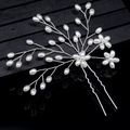 Elegant bridal silver hair pin with white pearls in flower shape on black background - 3-Flower Silver