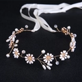 Detail of bridal headband with gold wires, white daisies, pearls, and ribbons - Style 2 Pearl Version