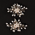 Detail of handmade bridal shoe clips with white pearls and sparkling crystals on gold wire - Gold