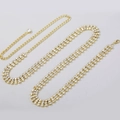 Detailed macro of golden three-row rhinestone waist chain with adjustable lobster clasp - Gold Triple Row