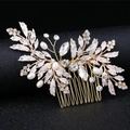 Elegant gold bridal hair comb featuring white enamel leaves, pearls and crystals - Pave Set Hair Comb / Gold White Pave